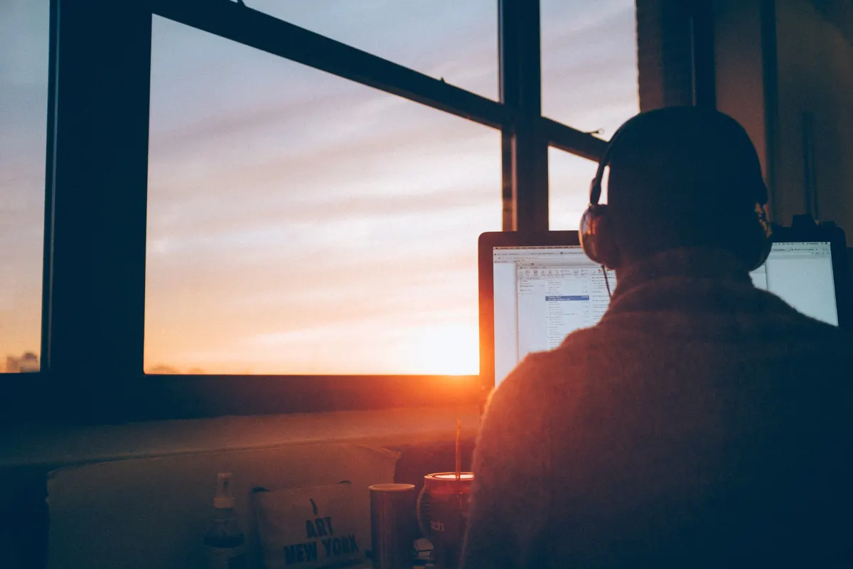 man working by computer